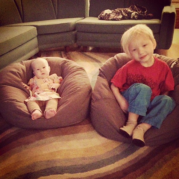 two s on bean bag seats in living room
