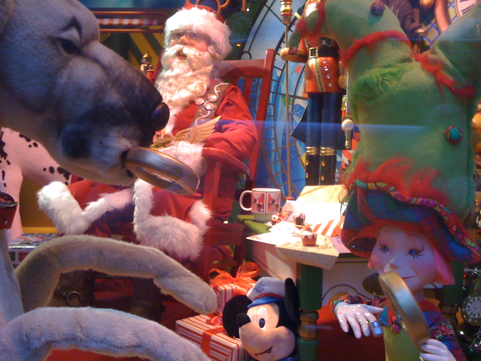 santa claus and other toys on display for s