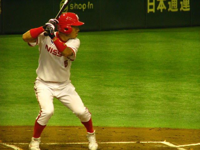 a baseball player at bat during a game