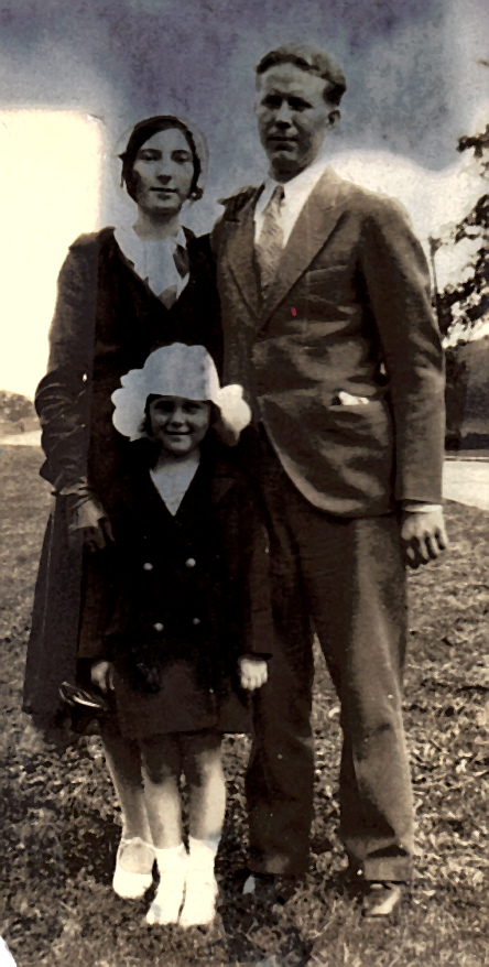 an old po of two adults and a child