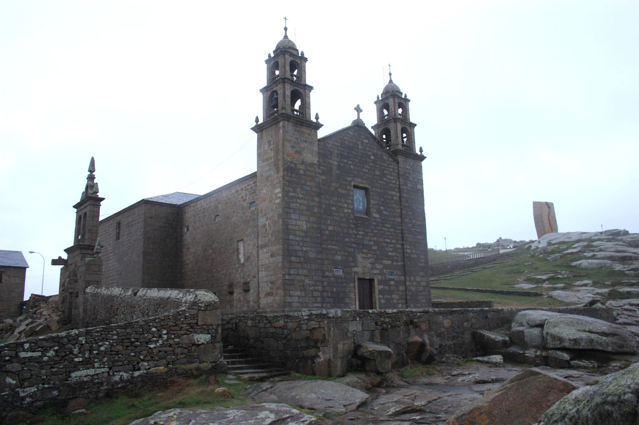 an old building with some steeples on it