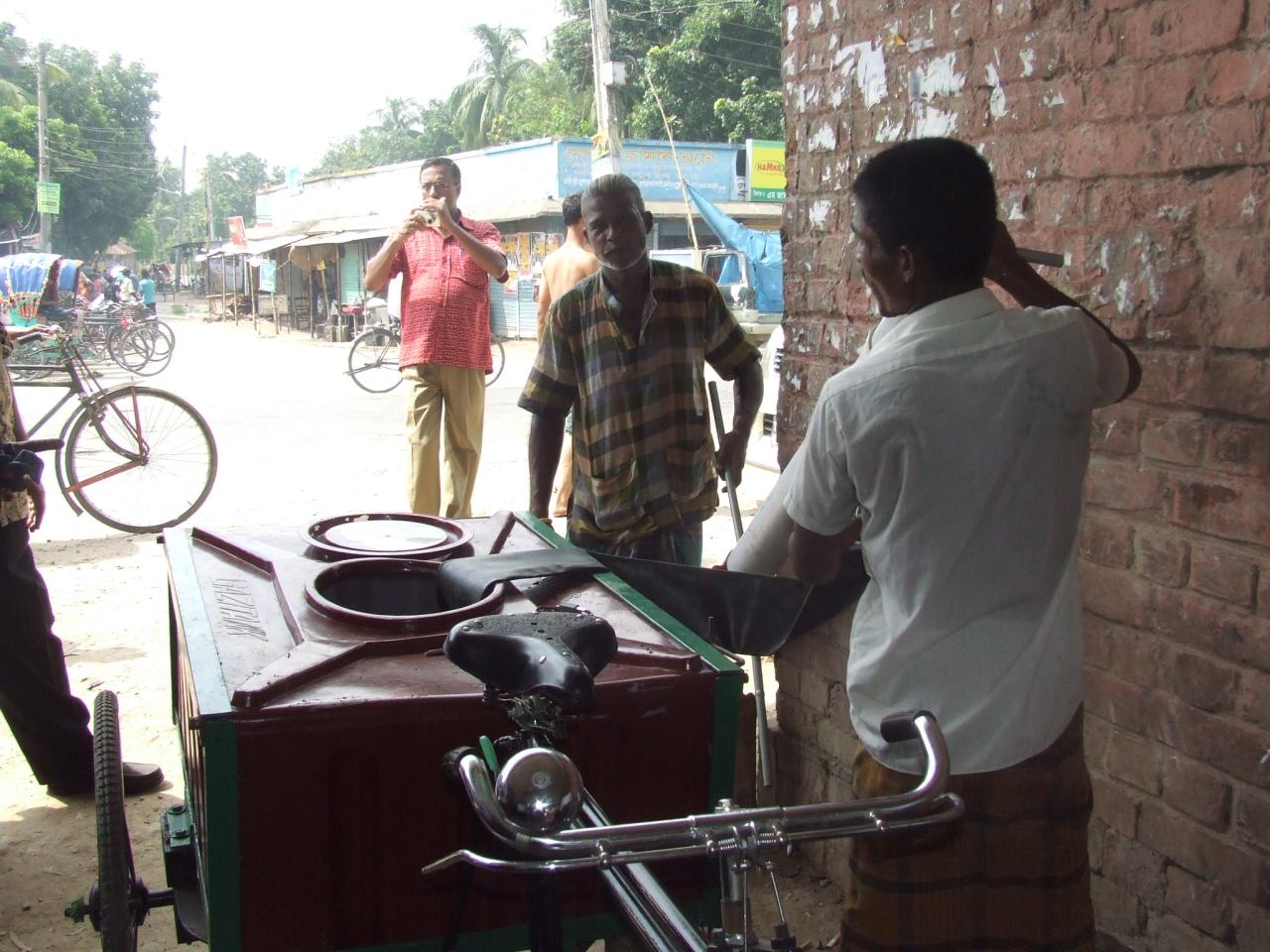 people are in the street getting ready to ride a bicycle