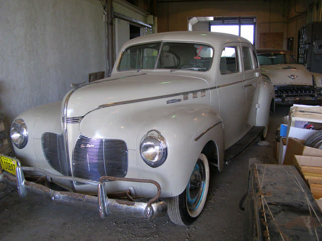 a picture of a vintage car in a garage