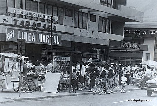a vintage po of a crowd on a street corner