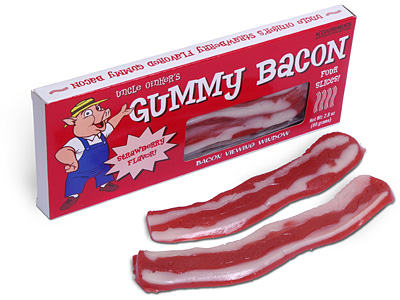three pieces of bacon sitting in front of the package