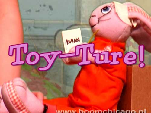 a pink toy rabbit with a happy greeting