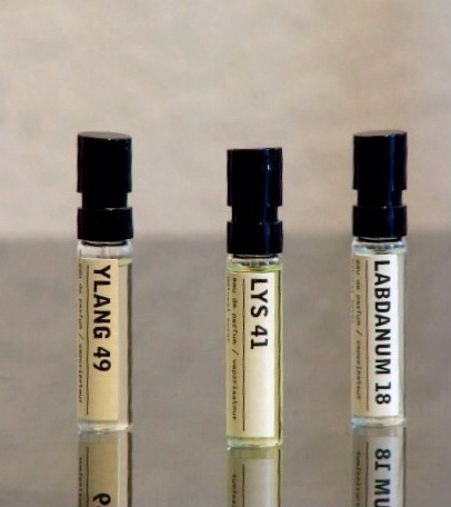 four vials with different sized bottles of different types