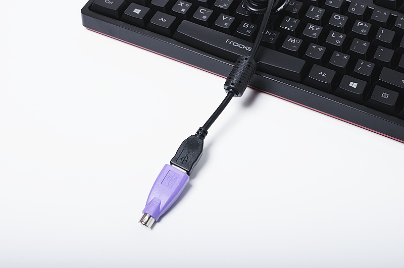 a purple and black cord and a keyboard