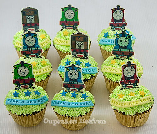 cupcakes shaped like thomas the train are ready to be eaten