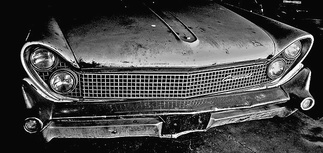 black and white po of an old muscle car
