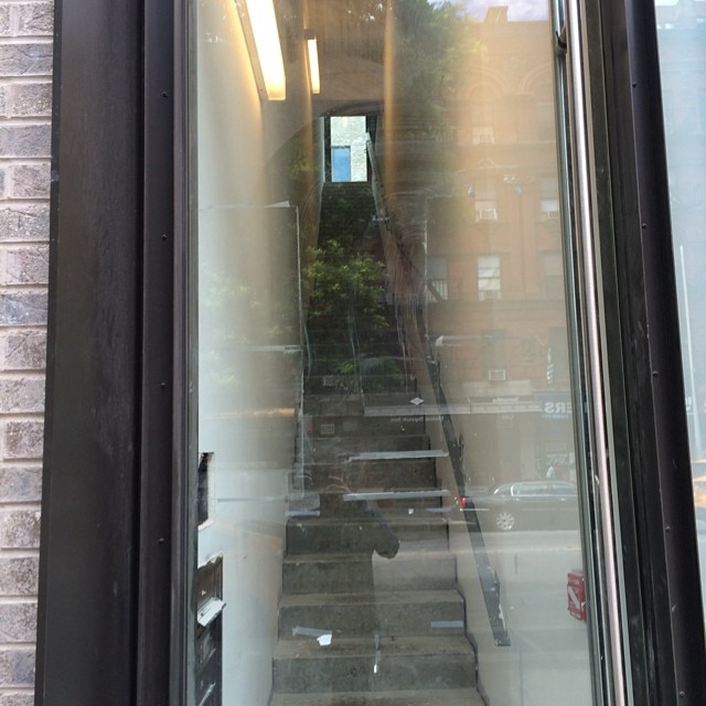 a bunch of steps on a window in a building