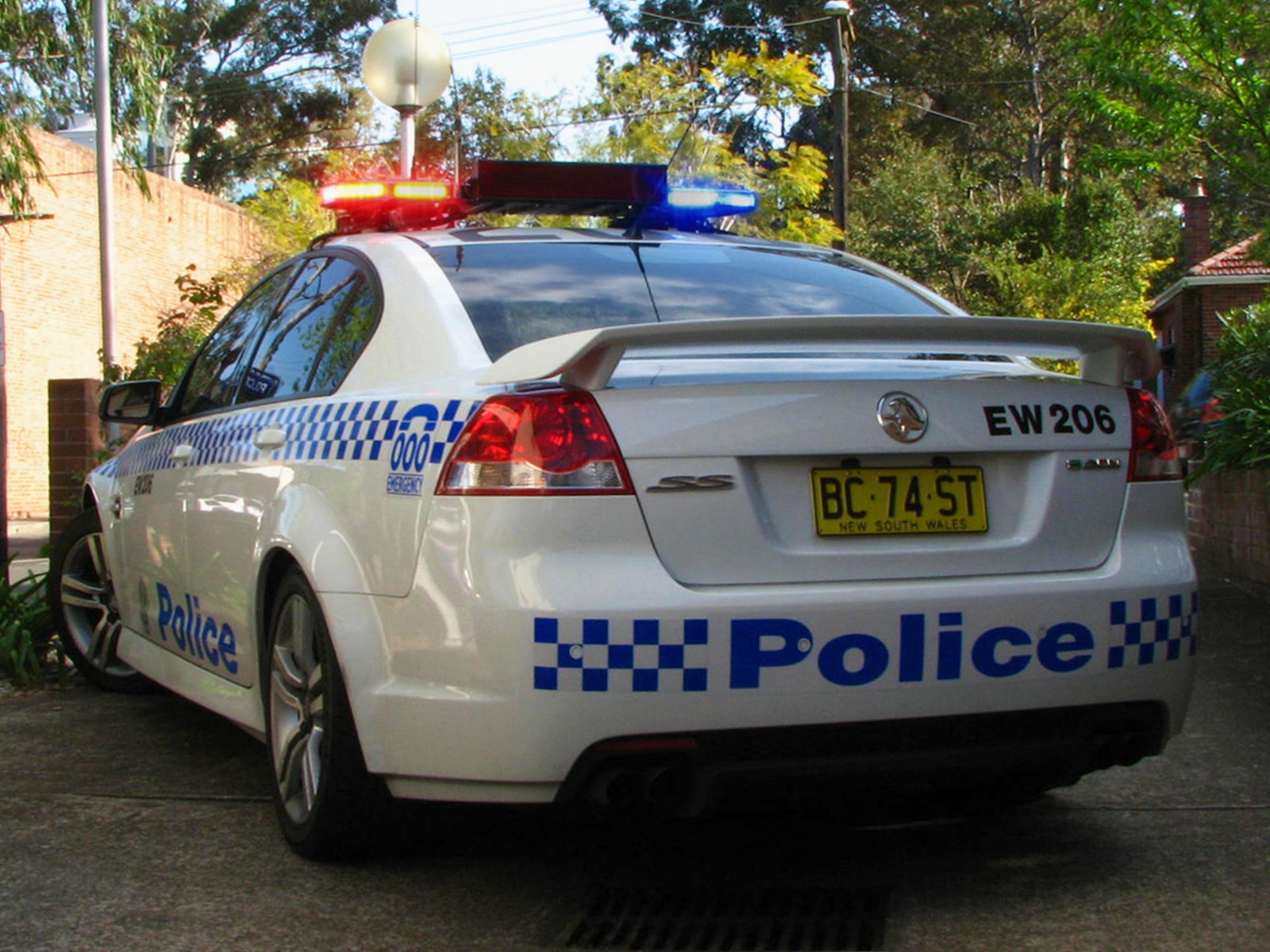 a police car parked on the side of the street