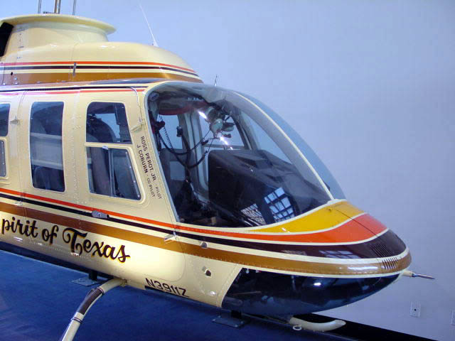 a yellow and red helicopter with the words spirit of africa written on it