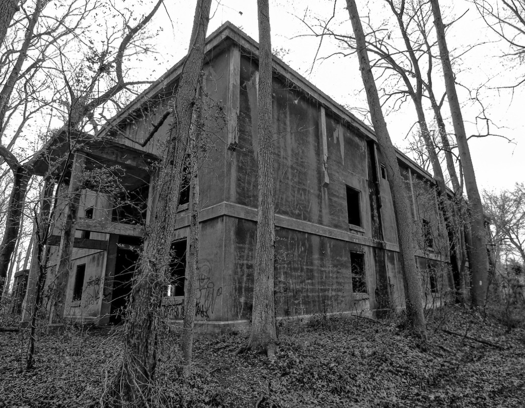 an old abandoned house in the woods near the woods