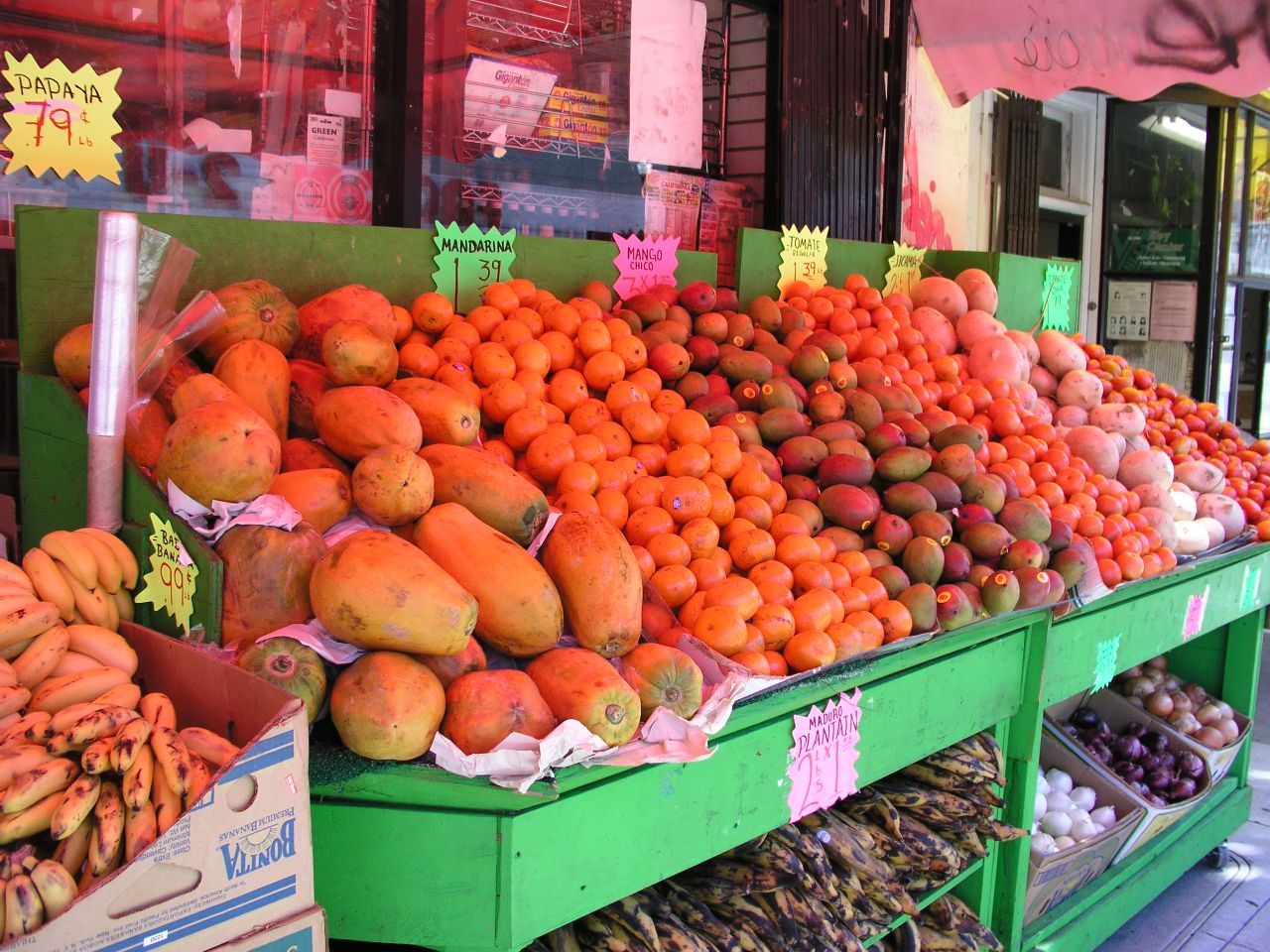 fruits for sale at a produce stand in a market