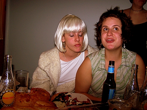 two women are having dinner at the table