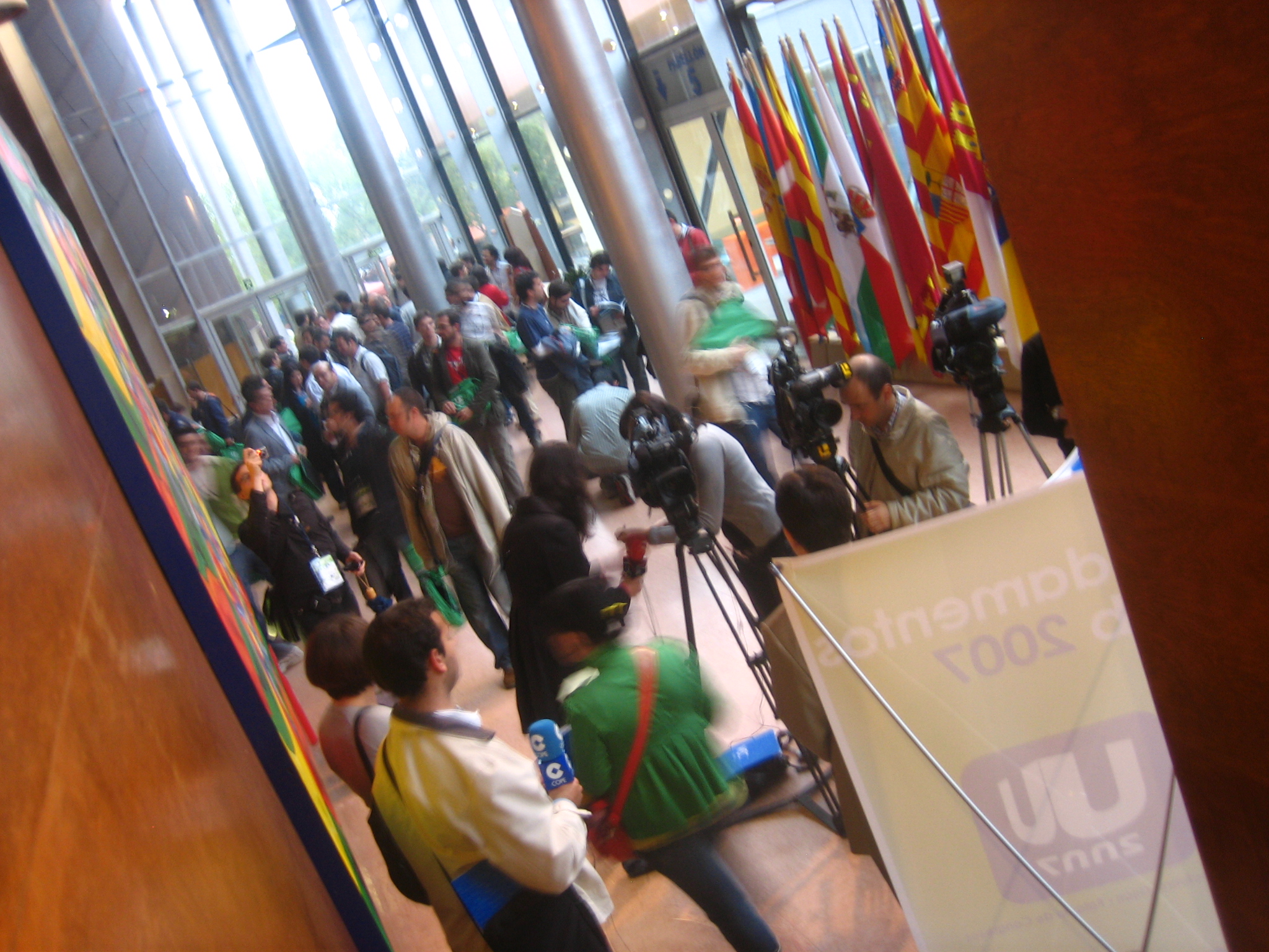 a large group of people standing in front of a building