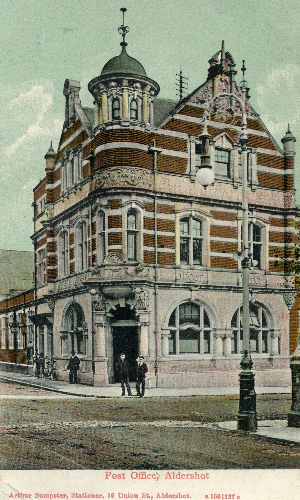 an old image of a building with two men on the side