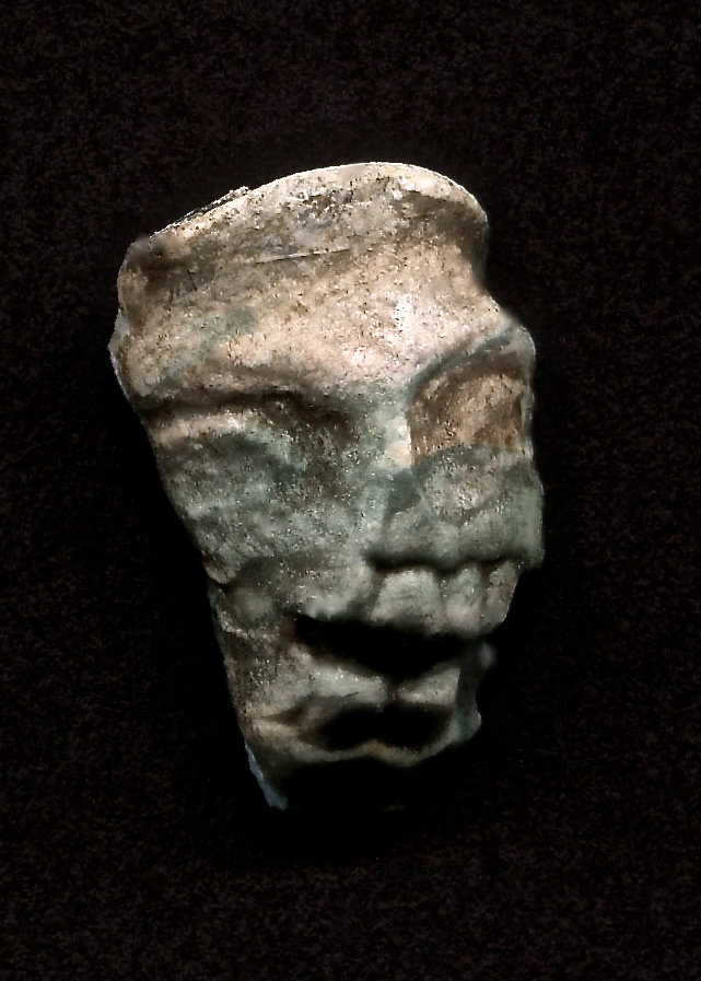 an ancient statue head looks as if it is from the past
