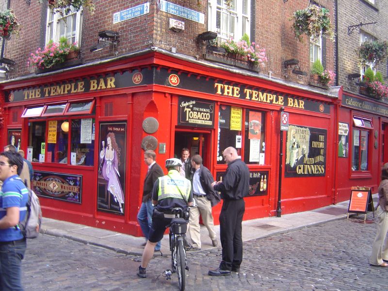 the temple bar on the corner of a street