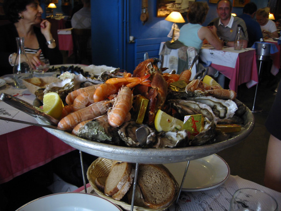 the tray has shrimp, and shellfish all over it