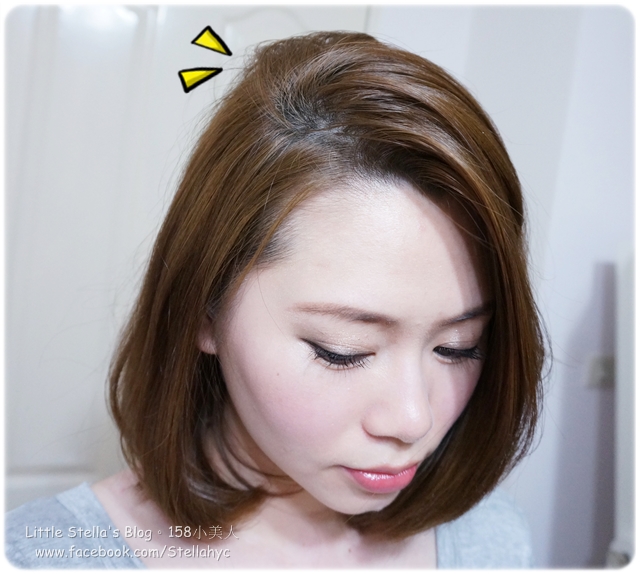 a woman is wearing a cute hairstyle with little yellow triangles