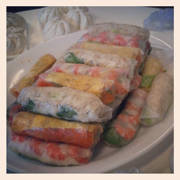 several wraps stacked on top of each other on a plate