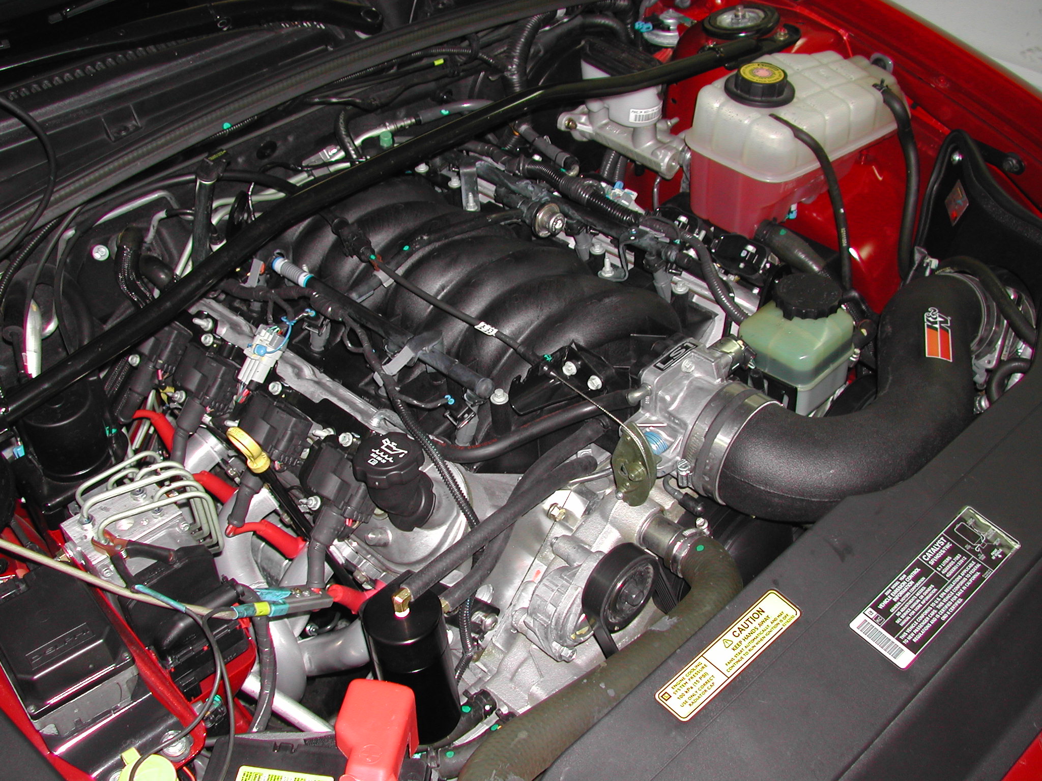 a car engine with a water pump inside