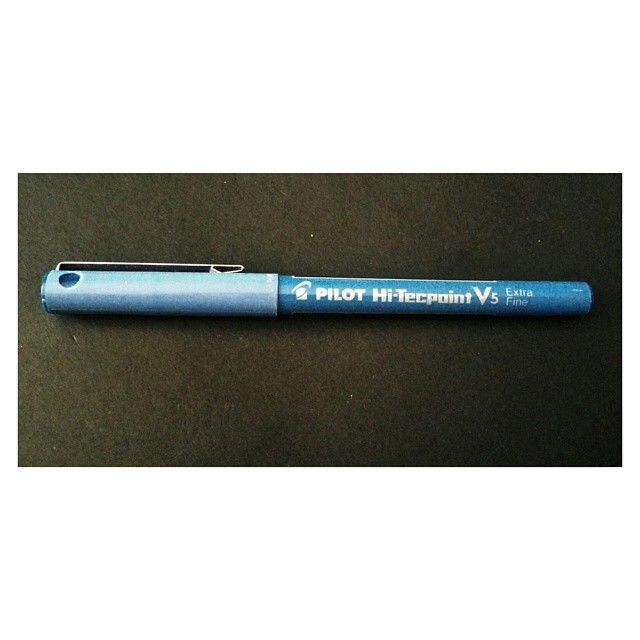 an image of blue writing pen that is not writing