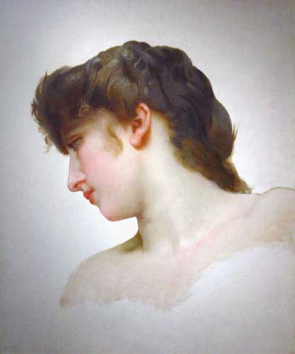 a young woman in profile with bare torso