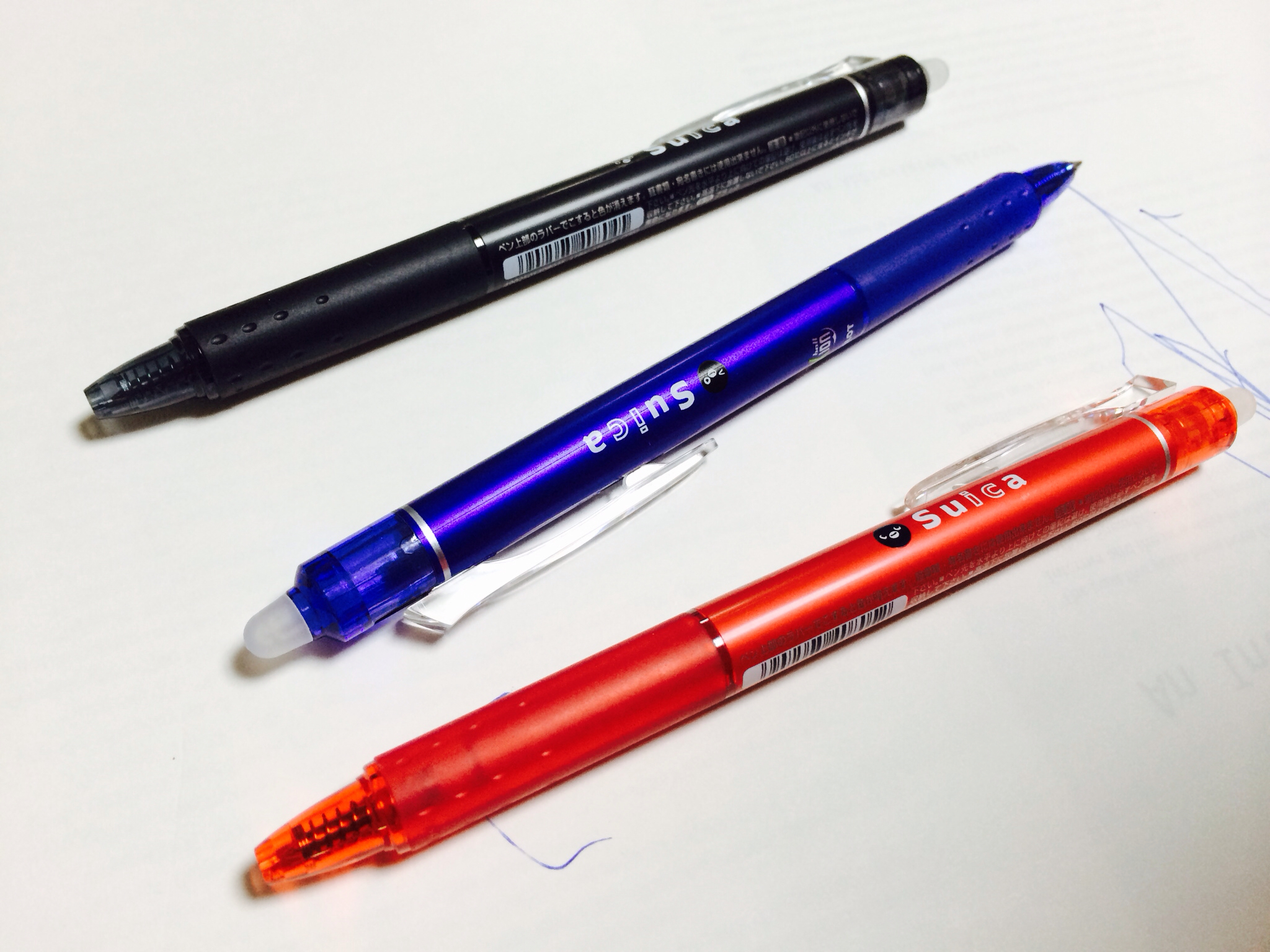 three pens with the same writing on them