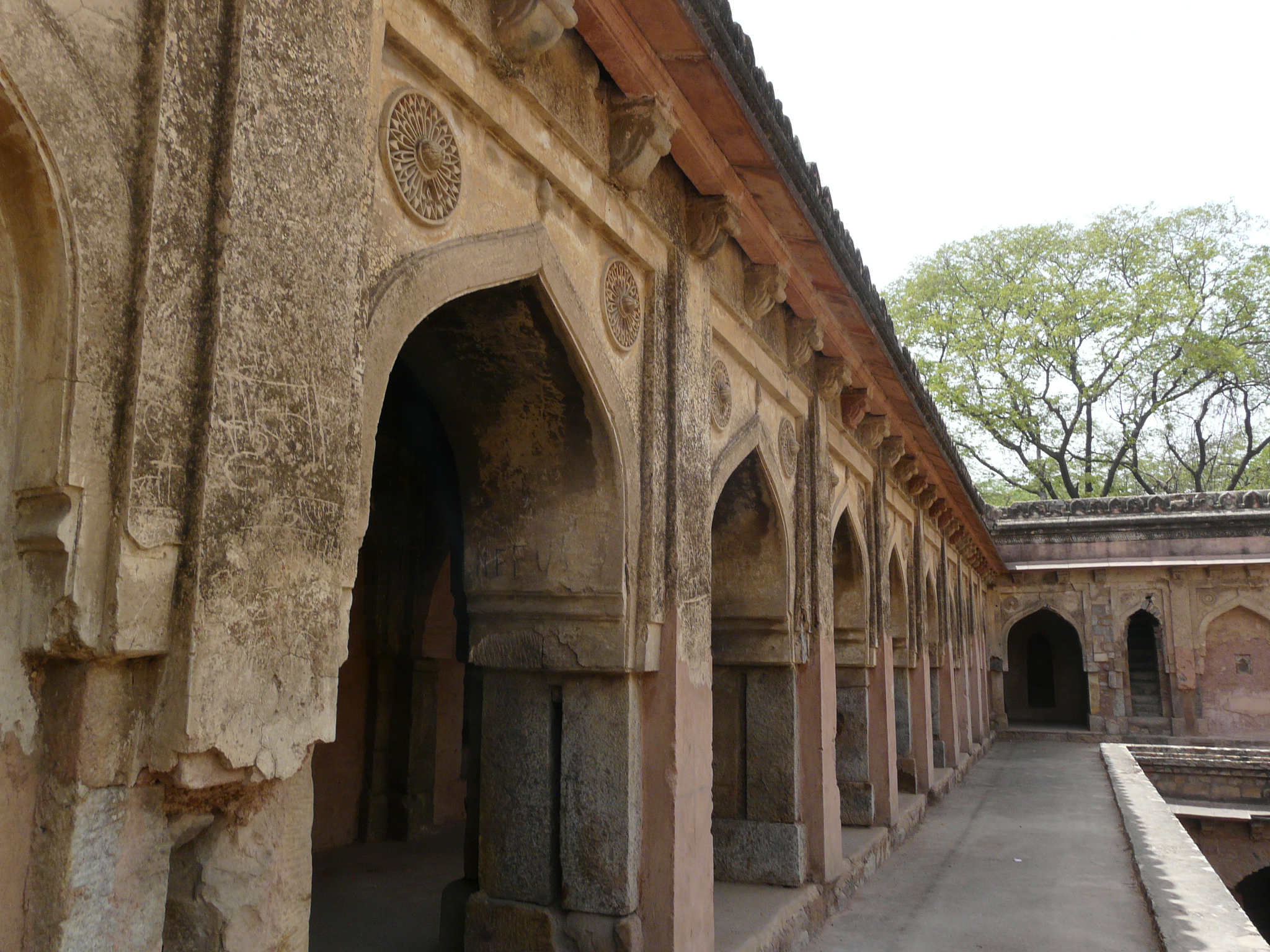 an old building with very ornately decorated columns