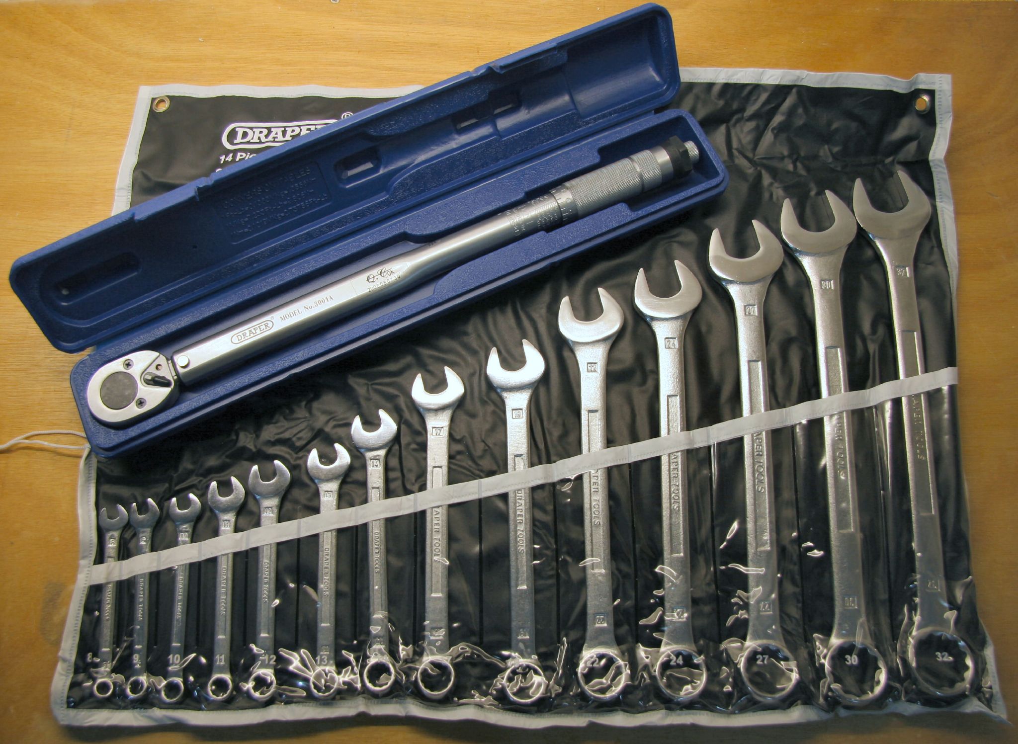 there is a tool box with many different wrenches