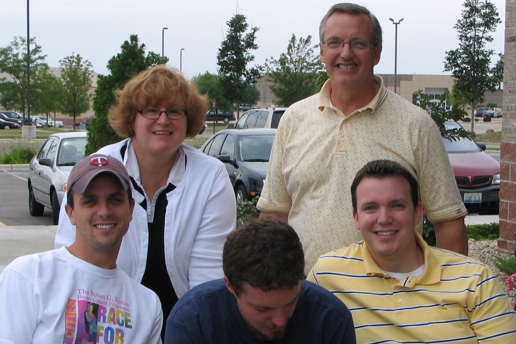 a group of people posing for a po