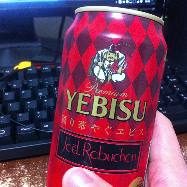 a can of yuba kuchu beer sitting on top of a desk