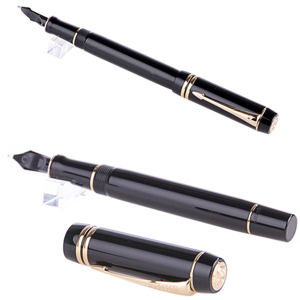 a black pen with gold trim next to an additional pen