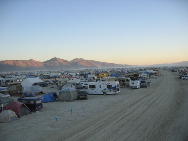 tents and trailers set up at the sand dunes