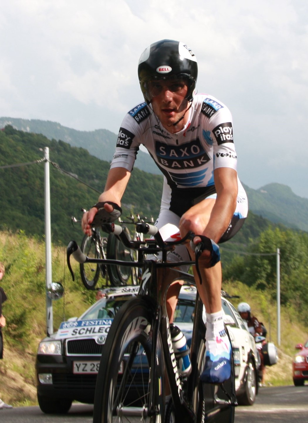 a male cyclist riding a bike on a road