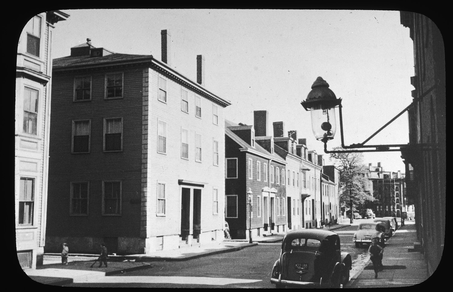 an old po shows a person walking down the street