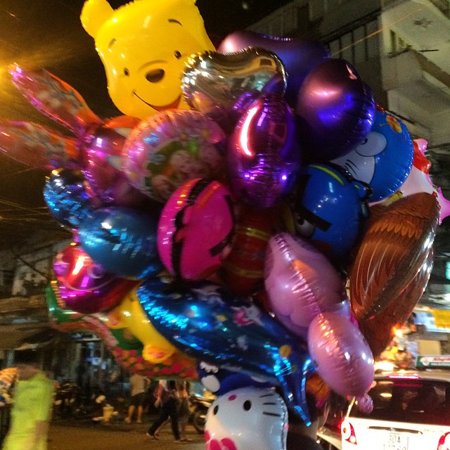the balloon sculptures are decorated with animals and stars