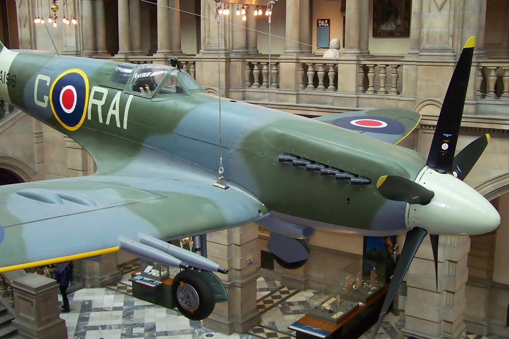 a fighter plane in front of an entrance