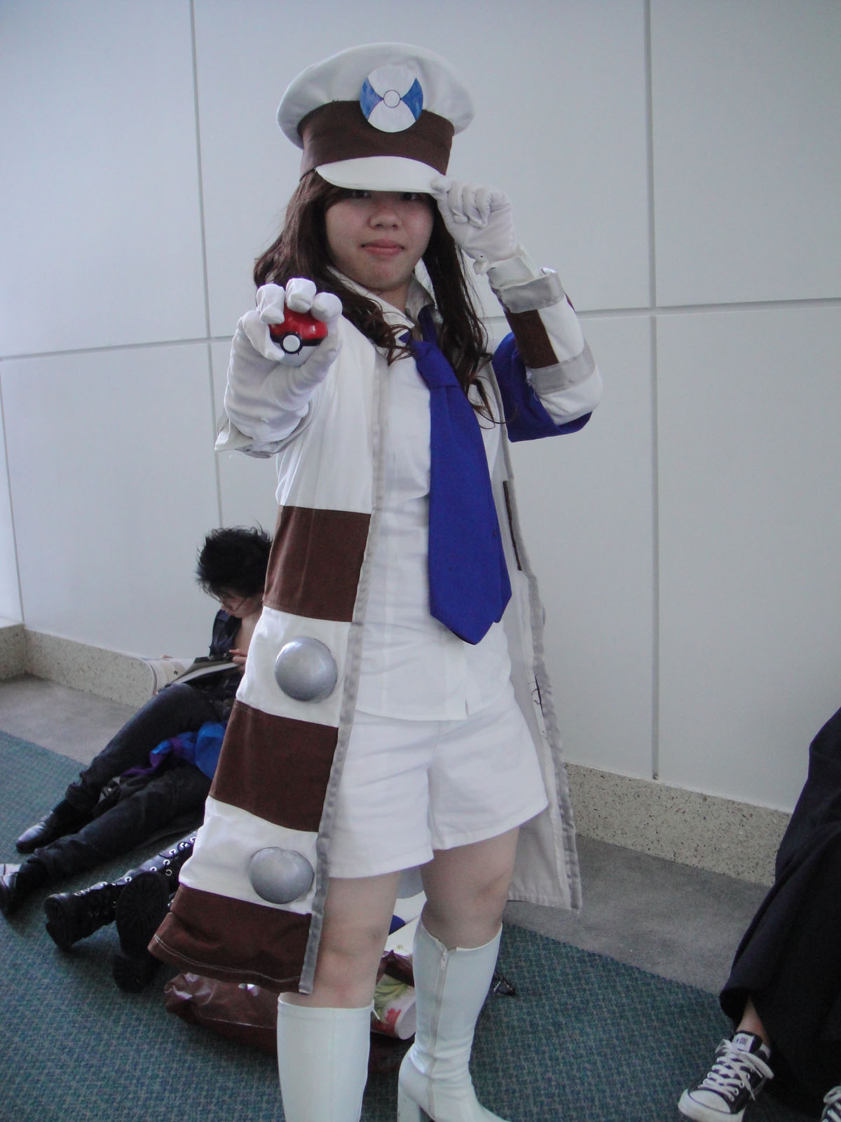 an asian woman dressed in a costume for an anime cosplay