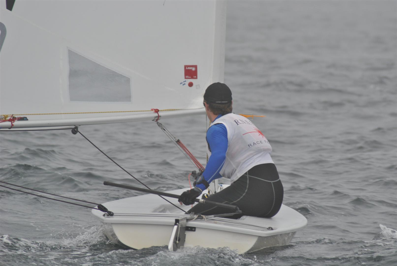 a male in a white shirt on a boat