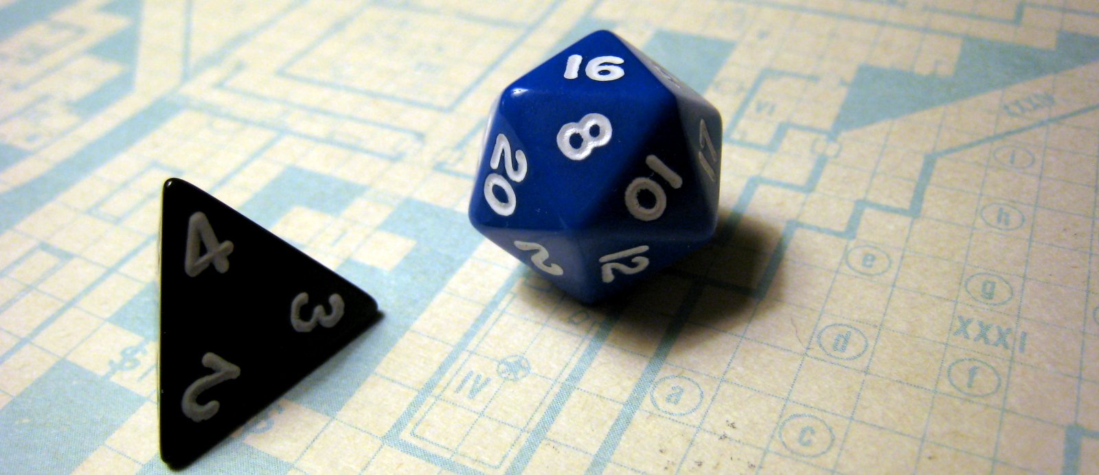 a pair of dice on the top of a box