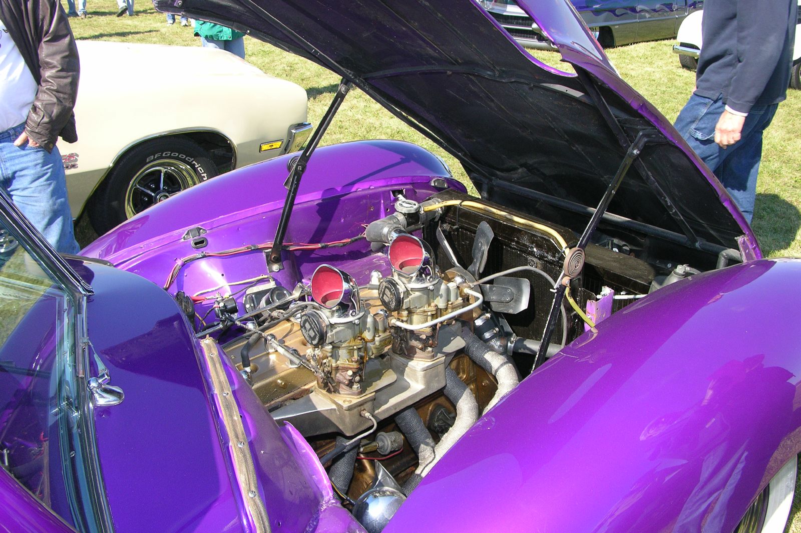 a car with a large engine in it's hood