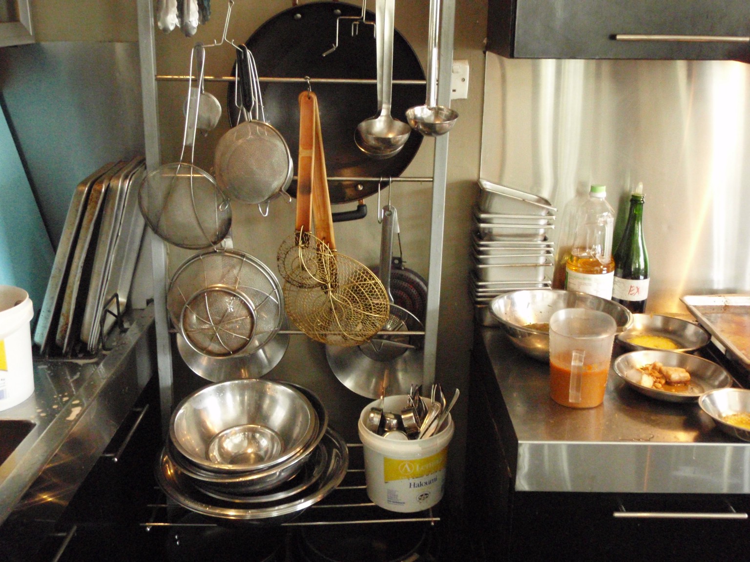 a bunch of pots and pans that are on a stove