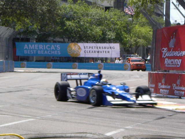 a race car is making it's way through the course
