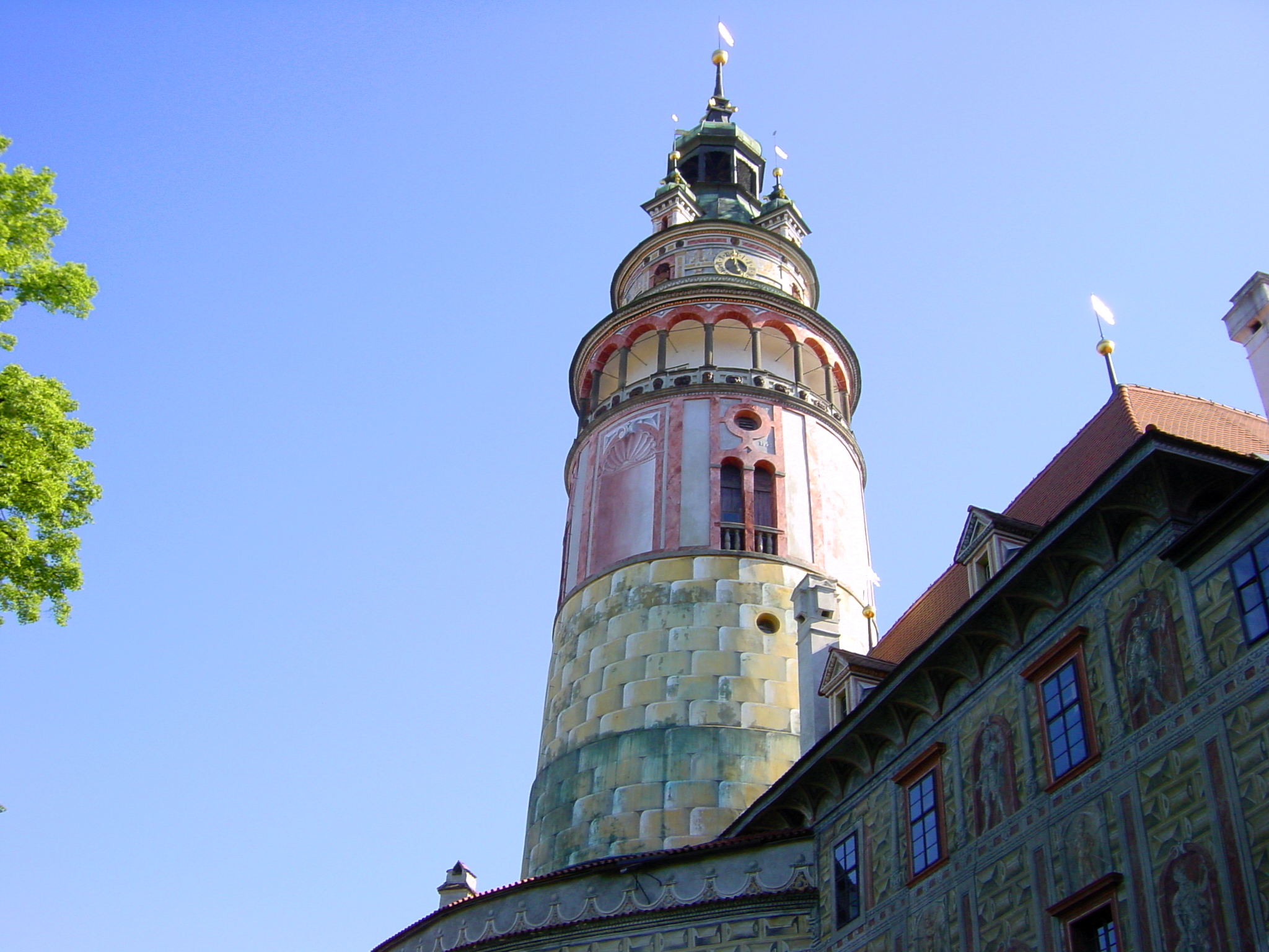 an elaborate building with a large clock on it's tower