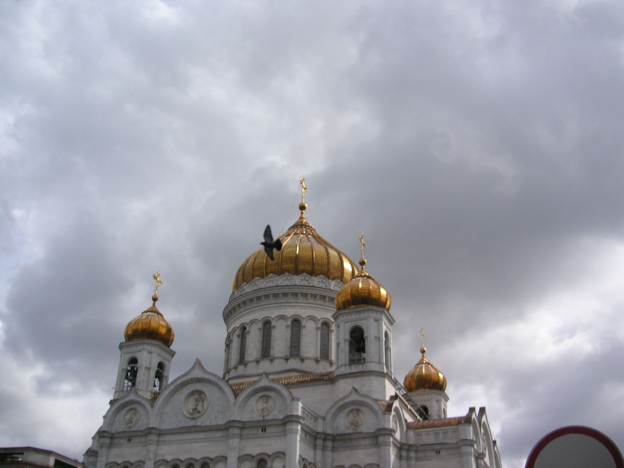 clouds gather over the top of the cathedral