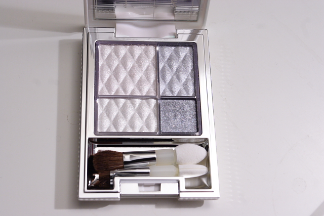 the makeup kit is organized in its holder